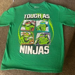 NWOT Nickelodeon Teenage Mutant Ninja.
Excellent Condition 
Green size 14/16